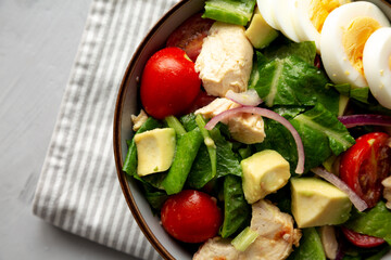 Homemade Honey Mustard Chicken Salad in a Bowl, top view. Flat lay, overhead, from above. Close-up.