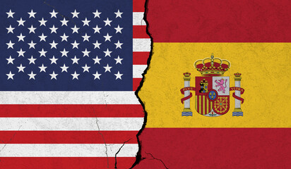 USA Spain flag cracked wall background