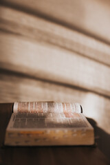 old book on wooden table bible