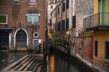 Fototapeta na wymiar Venetian glimpse with silky water and lagoon colors