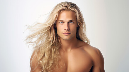Elegant sexy smiling Caucasian blond man with blond and long hair with perfect skin, on a white background, banner.