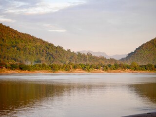 Mist on the Mekong River, Thailand, View landscape and flowing of water on river in morning time, Rainforest aerial view, Beautiful fog in the morning