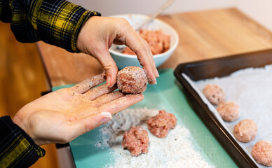 Cooking homemade meatballs. 
