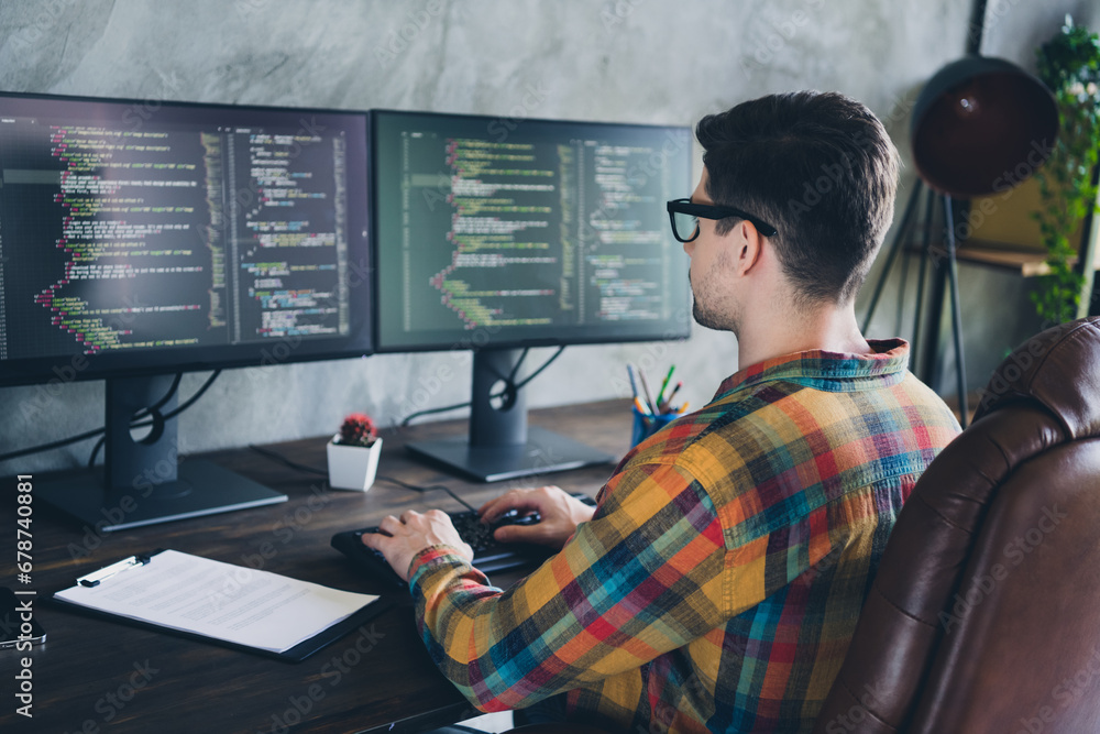 Aufkleber rear back view photo of remote worker man focused on creating perfect data analysis automatic bot co