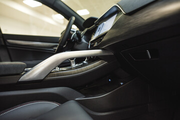 interior of an expensive car, steering wheel, panels