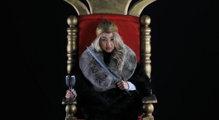 Obraz premium beautiful blonde viking queen on the throne
