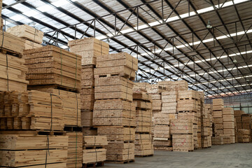 Pile of lumber in wooden warehouse storage. Pile of timber at warehouse storage. Pile of pallet in warehouse