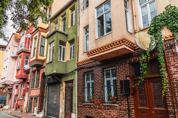 Old cozy narrow streets with colorful houses in the Fatih Balat district of Istanbul.