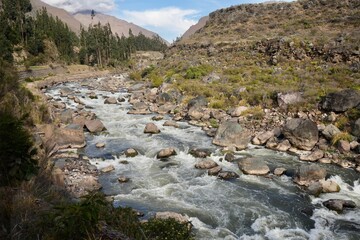 The Urubamba River in Peru with The Andes Mountains behind. 