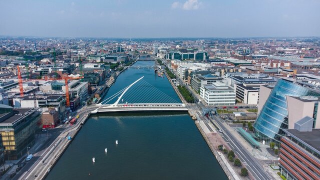 Aerial shot of cityscape of Dublin and the Samuel Beckett Bridge,a cable-stayed swingbridge,Ireland