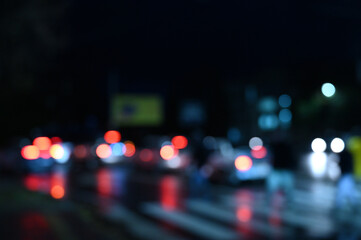 city ​​night lights cars defocused background