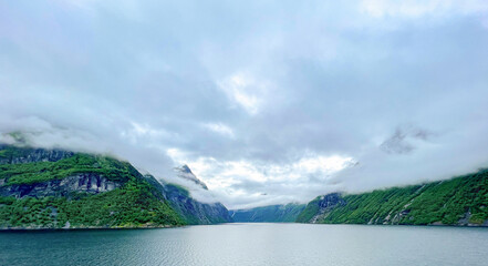 Beautiful fjords on a cloudy day in Norway - 678780892