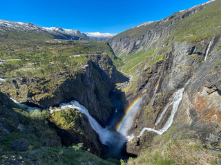 The famous waterfall Voringsfossen in Norway on a sunny day - 678781232
