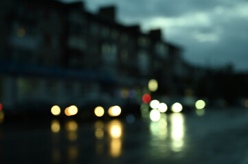 city ​​night lights cars defocused background