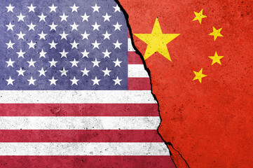 United States of America and China flags painted on the concrete wall.