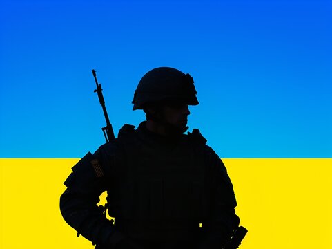 A soldier of the Ukrainian Armed Forces against the background of the flag of Ukraine