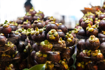 Mangosteen selling along the market side in Bangkok City, Thailand.