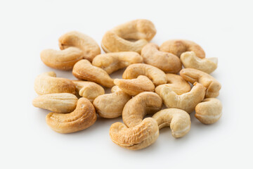 Dried cashew nuts. Macro shot. Raw snack. Pile cashew nuts without shell. Whole nut kernels	
