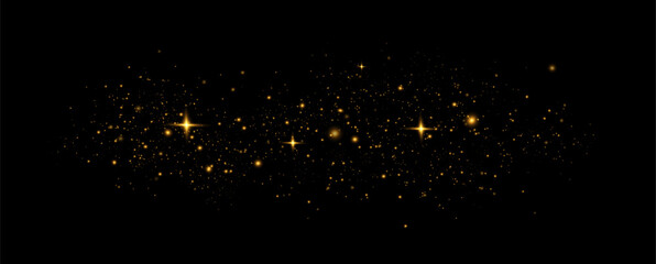 Golden sequins glow with many lights. Glittering dust. Luxurious background of golden particles.	