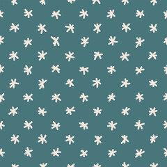 Seamless pattern with hand drawn snowflakes on blue background