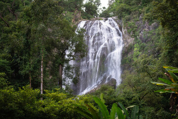 Fototapeta na wymiar Beautiful waterfall stream at Khlong-Lan National Park, Thailand