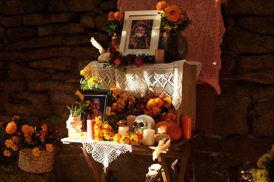 Altar in honor of the day of all the dead decorating with flowers and candles