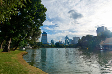 Landscape of a park with a large pond in the heart of Bangkok.
