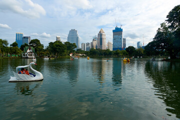Landscape of a park with a large pond in the heart of Bangkok.