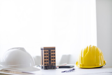 Yellow safety helmet were prepared for workers to wear before entering the construction area to...