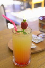 cocktail with strawberry and cake