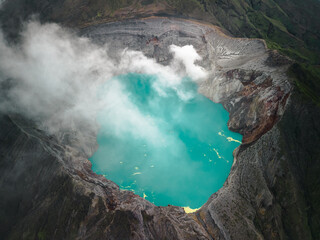 Java's Volcanic Gem: Aerial View of Mount Ijen and the World's Largest Highly Acidic Lake. Embark on a Natural Adventure in Indonesia, Asia's Premier Vacation Destination