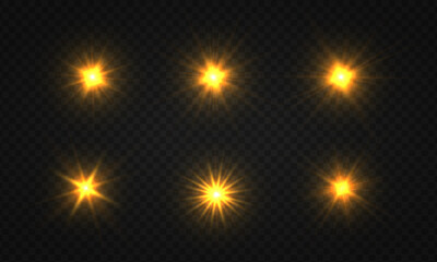 Set of bright star. Golden glowing light explodes on a transparent background.