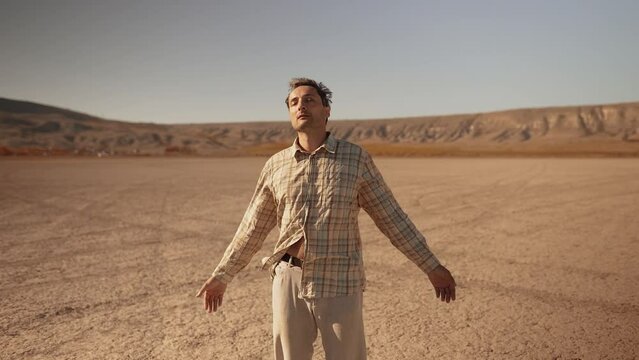 Exhausted man in a desert