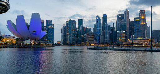 Panoramic view of Singapore city skyscrapers after sunset