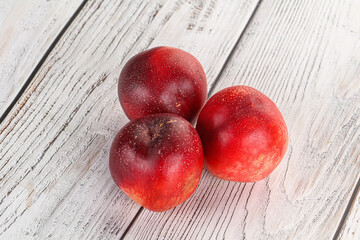 Ripe sweet juicy nectarines heap