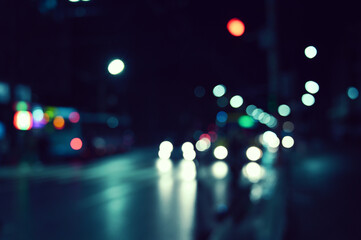 city ​​night lights cars defocused background