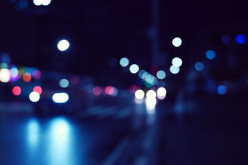 city ​​night lights cars defocused background