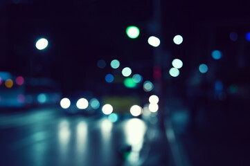 city ​​night lights cars defocused background