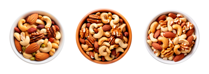 Mix of nuts such as almonds, cashews, peanuts, pecan nits om three different bowls over white transparent background