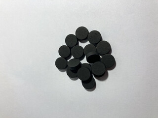 black tablets on a white background