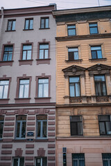 Facades of ancient buildings. Brown and yellow buildings. Historical value. Architecture of Old Europe