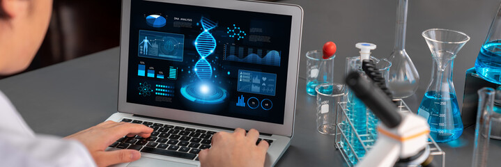 Scientist working on advance biotechnology computer software to study or analyze DNA data after making scientific breakthrough from chemical experiment on medical laboratory. Neoteric - obrazy, fototapety, plakaty