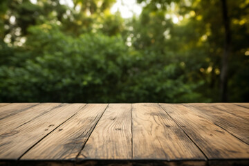 Wooden table surface with blurred forest backdrop