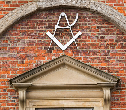 Masonic symbol of the Square and Compasses on a Sunderland, UK masonic lodge.