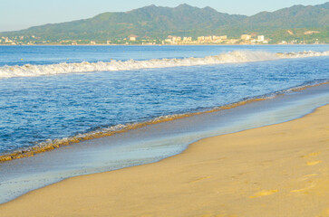 Set of pictures of a fantastic ocean wave in different stages. Blue sunrise sky. San Jose del Cabo. Mexico.