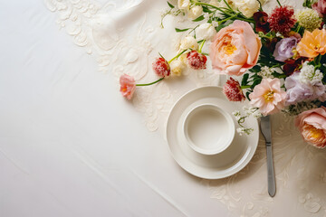 Elegant Wedding Decor: Top View of Refined Table Setting with Flowers on Cream White Tablecloth