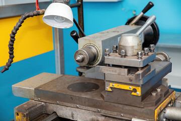 An old locksmith machine for production.