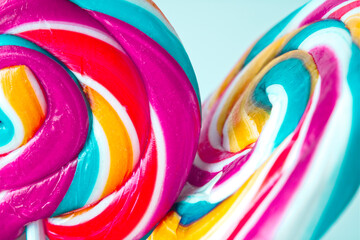 Close-up of swirly striped candy lollipops with shallow depth of field - obrazy, fototapety, plakaty