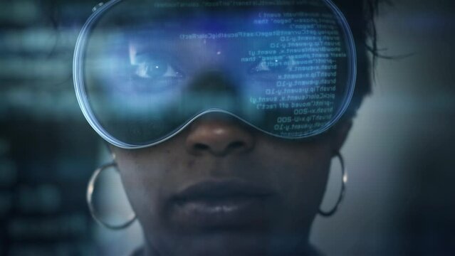 Young Female African American Developer Using VR Headset to Check Program Code. Futuristic Augmented  Virtual Reality.  Metaverse.