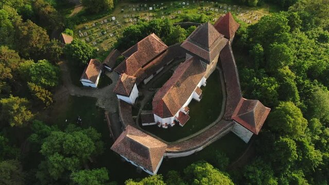 Fortified church and fortress of Viscri in Transylvania, Romania, Europe, Aerial view